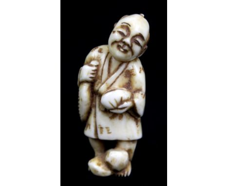 An early 20th century Japanese carved ivory netsuke of a fisherman, signed to foot, height 4.4cm.Additional InformationSome n