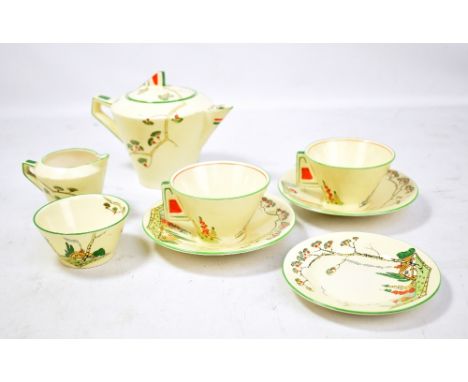 NORMAN; an early 20th century Art Deco tea for two set, with hand coloured cottage decoration (5).Additional InformationMost 