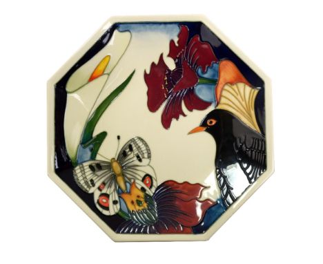 MOORCROFT; a 'Medley' pattern octagonal plate with tubelined decoration of butterfly, bird and flowers, multi-signed to rever