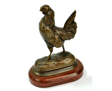 ALFRED DUBUCAND; a late 19th century French patinated bronze cockerel with impressed signature, mounted on oval rouge marble 