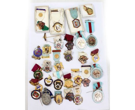 A collection of gilt metal and enamel Masonic and similar jewels, some boxed, numerous with 'Steward' bars.