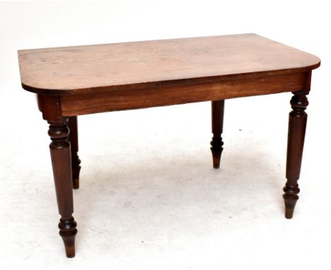 A Victorian mahogany side table, formerly part of a dining table, raised on tapering ring turned supports, width 121cm.