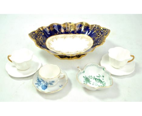 A small group of ceramics comprising a pair of Foley 'Dainty' shape coffee cans and saucers, registered no. 272101, a Meissen