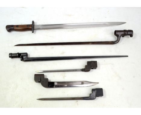 A British Wilkinson of Pall Mall military issue pipe back bayonet with metal mounted leather scabbard, a socket bayonet stamp