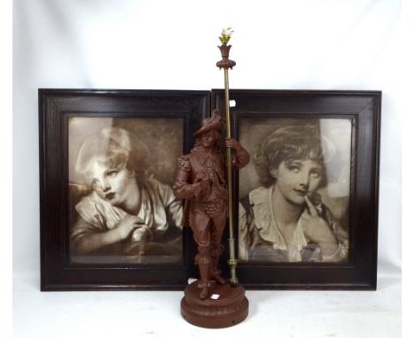 A painted cast iron figural table lamp base, height 67cm including fitment, and a pair of black and white prints depicting ch