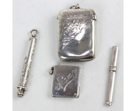 WILLIAM HAIR HASELER; an Edward VII hallmarked silver vesta case with bright cut foliate decoration, Birmingham 1902, length 