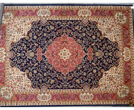 A blue ground Keshan carpet, 280 x 200cm.