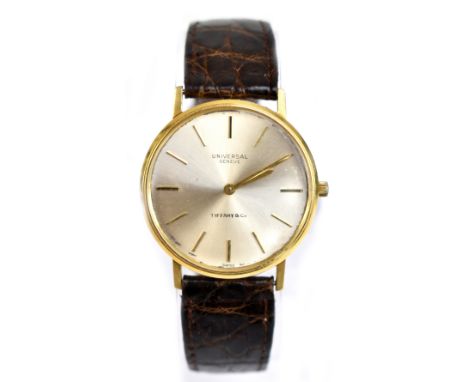 UNIVERSAL, retailed by Tiffany &amp; Co; a gentleman's vintage 18ct yellow gold wristwatch, the circular silvered dial set wi