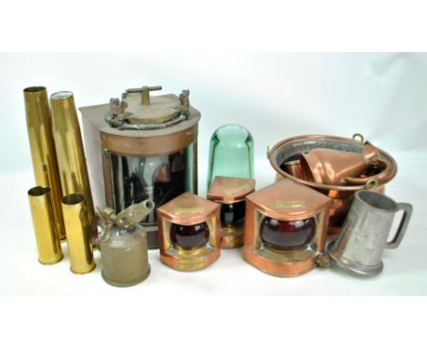 A group of metalware including a copper ship's lamp later converted to electricity, three smaller ship's lanterns with colour