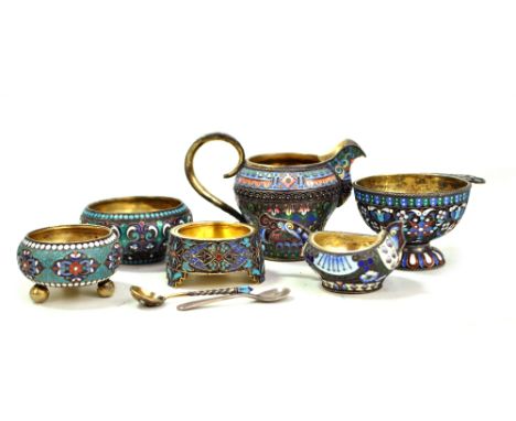 A group of late 19th and early 20th century Russian&nbsp;champlevé enamel decorated silver to include a kovsh shaped salt, ma