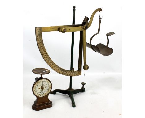 VANDOME TITFORD &amp; CO LTD OF LONDON; a set of early 20th century brass counterbalance scales on tripod base, height 48cm a