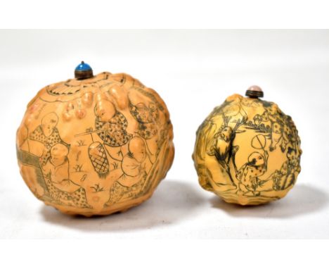 A Chinese gourd dried vegetable snuff bottle engraved and inked with figural scenes of boys playing, with verses of character