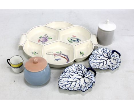 POOLE POTTERY; a six division twin handled dish with painted decoration, width 33cm, and two lidded jars, also a pair of Wedg