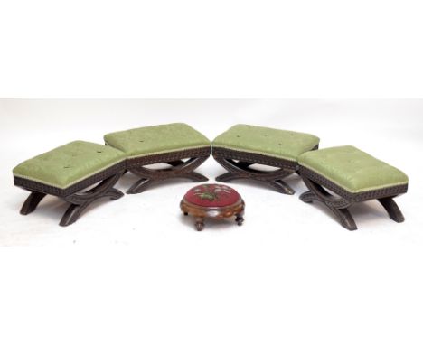 A set of four carved oak footstools with button padded upholstered tops and a beadwork decorated circular stool (5).Additiona