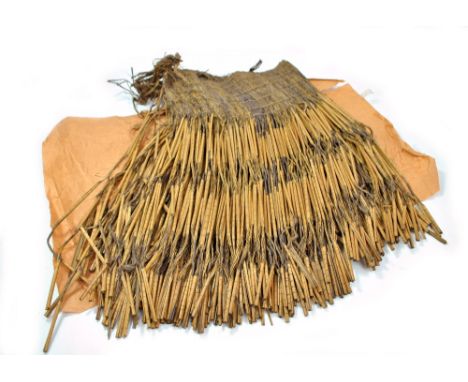 A tribal skirt, width approx 70cm.Additional InformationSome breakages and losses, general wear and tear throughout. Vendor h