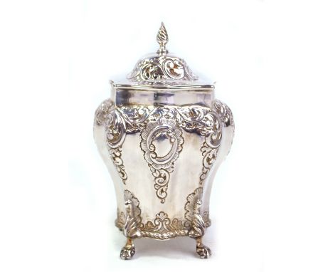 CHARLES HORNER (probably); an Edward VII hallmarked silver tea caddy of lobed inverted baluster form, with embossed foliate s