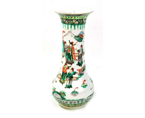 A late 19th century Chinese Famille Verte vase with everted rim, baluster body decorated with figures in a continuous landsca