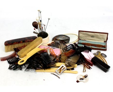 A group of dressing table and related items including hat pins, hair ornaments including tortoiseshell piqué examples, stick 