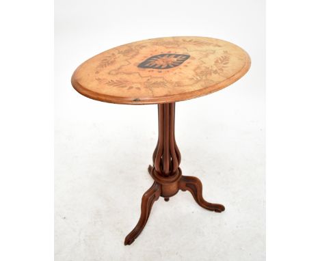 A tilt-top tripod occasional table with floral inlaid oval top, height 72cm.