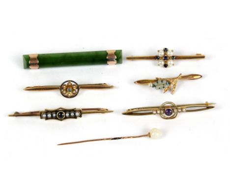 Six various bar brooches comprising two 15ct gold, two 9ct gold and yellow metal examples, and a 9ct gold mounted nephrite ja