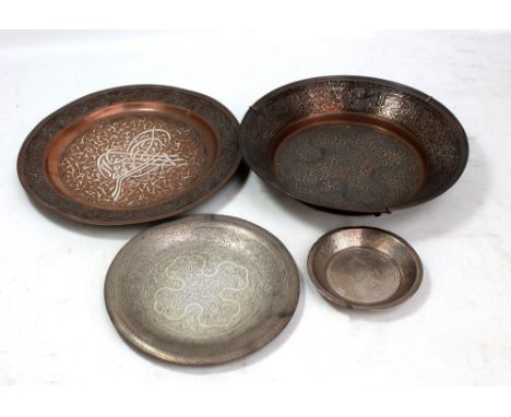 A pre-1947 Egyptian silver circular plate engraved with various ornamental motifs, diameter 22.5cm, and a hallmarked silver E