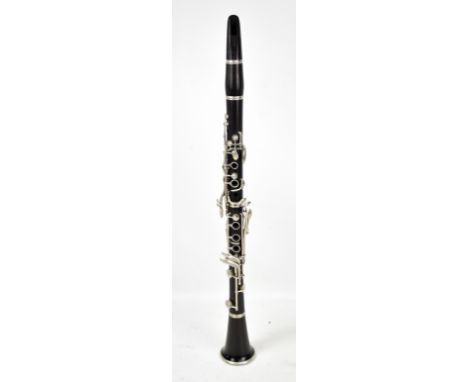 An ebony B-flat clarinet, with white metal mounts, stamped 'Made in England 98756', cased.Additional InformationSurface scrat