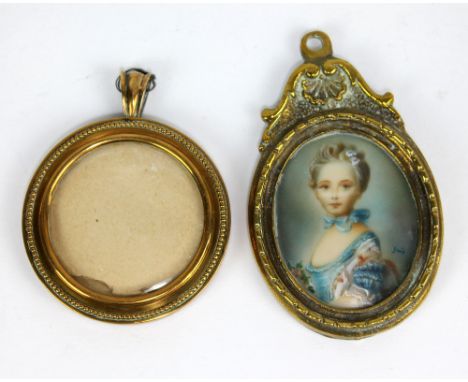 An unusual circular locket with hinged easel back, diameter 5.25cm and an oval portrait miniature in brass frame, height 8cm 