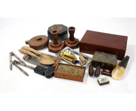 A mixed group of collectors' items including a pair of wooden candlesticks, a leather cased tape measure, a mahogany box, a s