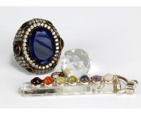 A&nbsp;chakra pendant, a crystal pendant and an Indian large dress ring (3).