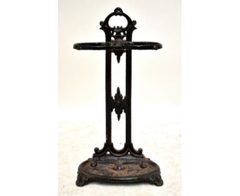 A cast iron two division stick stand.