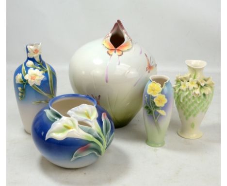 FRANZ; five porcelain vases with moulded decoration, the largest featuring butterflies, height 28cm, and the four smaller wit