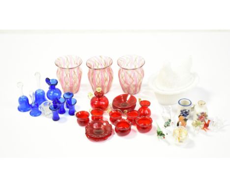 A collection of miniature glass pieces to include blue glass lemonade set, animals ornaments and a hen and nest, also miniatu