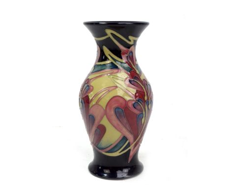 MOORCROFT; a floral tubeline decorated baluster vase with flared rim, impressed marks and year cipher for 2009 to base, heigh