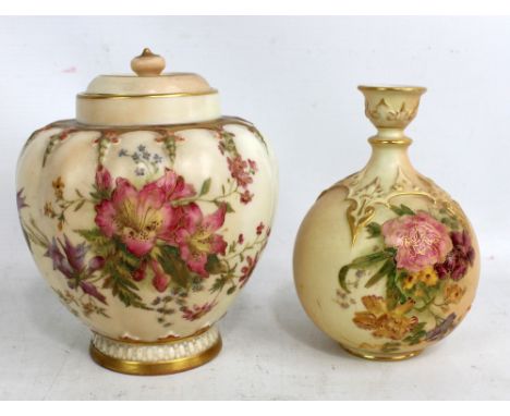 ROYAL WORCESTER; a blush ivory lidded lobed vase with painted and gilt heightened floral decoration, printed green mark and n