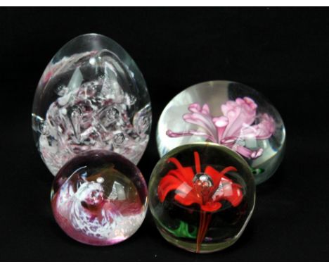Four glass paperweights including a Caithness 'Moon Crystal' example (4).&nbsp;Additional InformationSurface scratches, marks