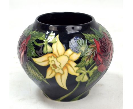 MOORCROFT; a navy ground 'Diamond Jubilee' pattern tubeline decorated vase with impressed marks, year cipher for 2012 and Nic