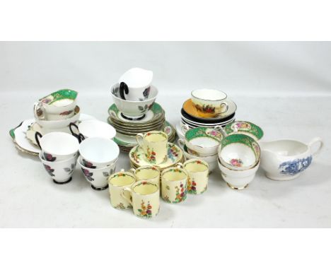 ROYAL ALBERT; a 'Masquerade' pattern six setting tea service comprising trios, cream jug, sugar bowl and sandwich serving pla