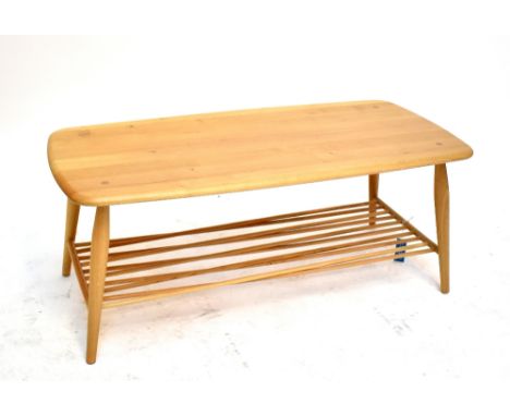 ERCOL; a light oak 'Chiltern' coffee table with undertier, width 108cm.