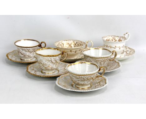 FLIGHT, BARR &amp; BARR; a pair of 19th century gilt decorated cups and saucers, diameter of saucers 16cm, and four other exa