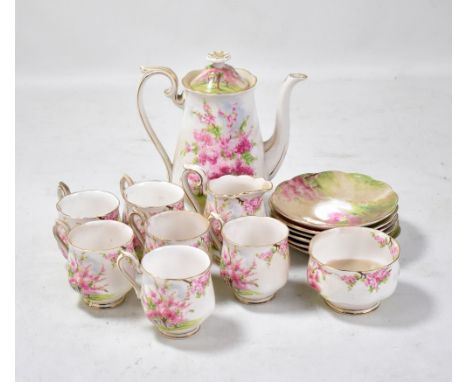 ROYAL ALBERT; a 'Blossom Time' pattern coffee set comprising a coffee pot, six cups and saucers, a cream and a sugar bowl.Add