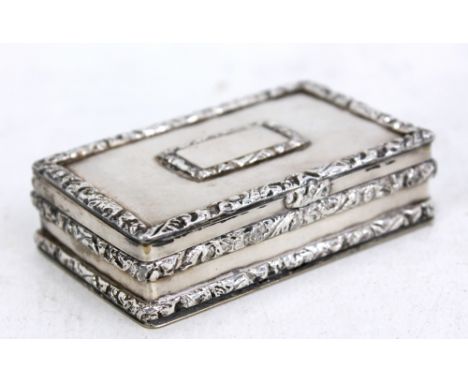 A 19th century white metal snuff box with chased foliate scroll detail, unmarked, 6.5 x 4cm.Additional InformationUnmarked as