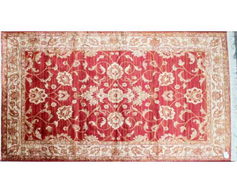 A red ground Ziegler carpet, 230 x 160cm.