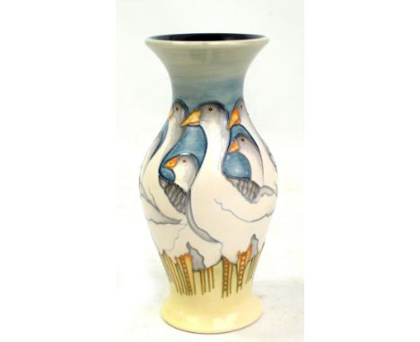 MOORCROFT; a light blue and yellow ground 'Fowlers Farmyard Geese' pattern tubeline decorated baluster vase flared rim, impre