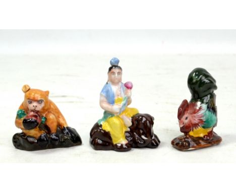 Three Chinese enamel painted ceramic miniatures modelled as the Bodhisattva of Universal Virtue Samantabhadra on elephant, ro