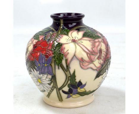 MOORCROFT; a purple and cream ground 'Ophelia's Flowers' pattern tubeline decorated vase, impressed marks and year cipher for