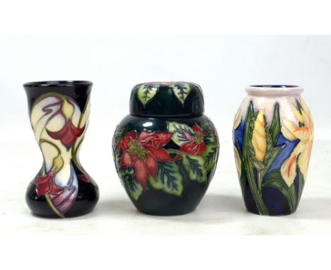 MOORCROFT; two floral tubeline decorated vases including 'Windrush' pattern example and a lidded jar, all small sized with im