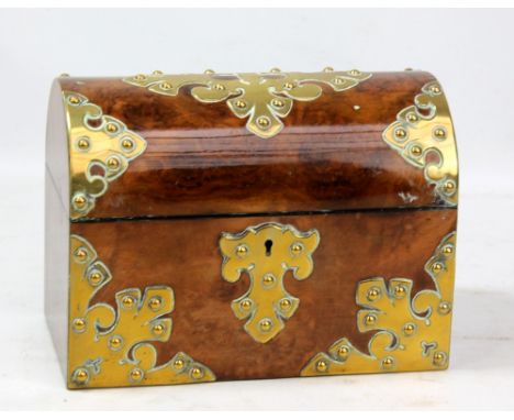 A figured walnut and brass decorated Victorian dome topped two division tea caddy, width 23cm.Additional InformationLight sur