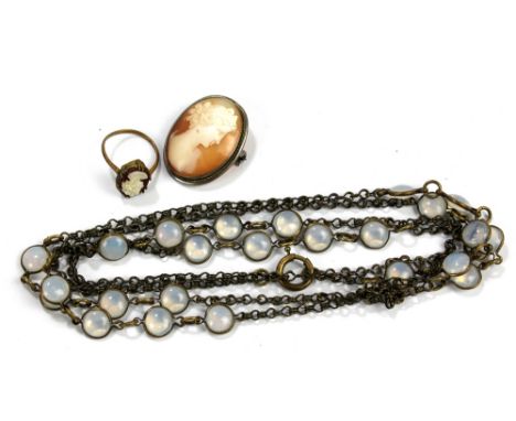 A moonstone long necklace, an oval cameo brooch and a cameo ring (3).Additional InformationRing misshapen and repaired, some 