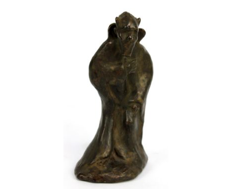 An unusual early 20th century glazed pottery figure believed to be a prototype possibly for Royal Doulton, indistinctly signe