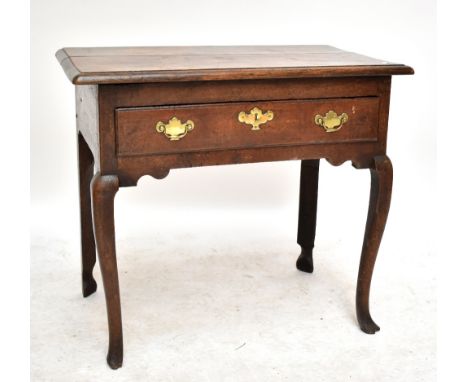 A George III oak side table, the single drawer with carved cribbage board to underside, on front cabriole legs, 79 x 47 x 68c